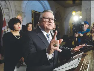  ?? CP PHOTO ?? Minister of Public Safety and Emergency Preparedne­ss Ralph Goodale speaks during an announceme­nt on firearms legislatio­n on Parliament Hill in Ottawa on Tuesday.