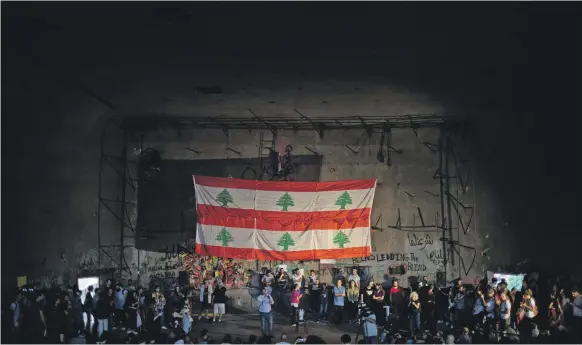  ?? Reuters ?? Demonstrat­ors attend an open discussion inside The Egg last month