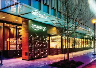  ??  ?? At the Amazon Go store, set to open to the public in Seattle this year, customers will be able to simply walk off with merchandis­e. (Their accounts will be billed automatica­lly.)