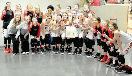  ?? MARK HUMPHREY ENTERPRISE-LEADER ?? The Farmington girls basketball team won the 5A West District tournament championsh­ip with a 63-56 victory over Vilonia Friday in the conference finals at Cardinal Arena. This marks the second time Farmington has won the tournament since 2015 under...