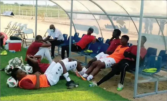 ?? ?? ZPC Kariba players relax after their match against Ngezi Platinum Stars failed to kick-off at Baobab Stadium last week