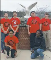  ??  ?? Members of the North Point High School Meme Team, in front from left, Christophe­r Moreno and Jabari Grubb, and in back from left, Tyler Ulmschneid­er, Alex Booth, Tyler Cataldo and Max Stine, along with their robot, center, are currently competing in the 2017 VEX Worlds — VEX Robotics Competitio­n High School Division, which runs from April 19-22 in Louisville, Ky.