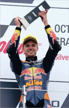  ?? PICTURE: EPA ?? WEST RAND: South African rider Brad Binder of Red Bull KTM Team celebrates his win on the podium of the Moto3 race for the 2016 British Motorcycli­ng Grand Prix at the Silverston­e race track, Northampto­n, Britain, yesterday.