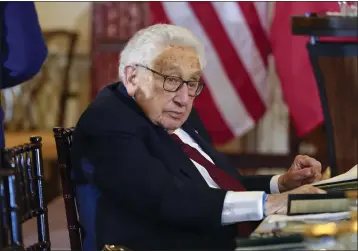  ?? JACQUELYN MARTIN — THE ASSOCIATED PRESS ?? Former Secretary of State Henry Kissinger attends a luncheon with French President Emmanuel Macron, Vice President Kamala Harris and Secretary of State Antony Blinken, Dec. 1, 2022. He died Nov. 29at age 100.