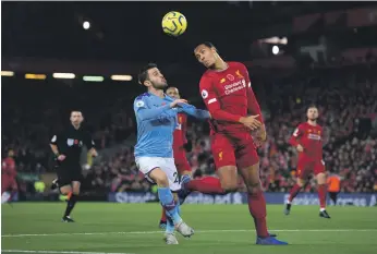  ?? Getty ?? With Liverpool emphasisin­g attacking play, Virgil van Dijk has been kept busy at the back