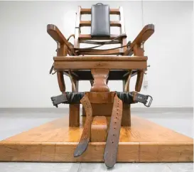  ?? STEVE HELBER/AP ?? The electric chair in the death chamber at Greensvill­e Correction­al Center last month in Jarratt, Virginia. In March, Virginia abolished the death penalty.
