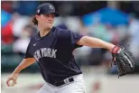  ??  ?? Yankees starting pitcher Gerrit Cole throws during a spring training game March 5 against the Tigers in Lakeland, Fla.