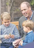  ?? [KENSINGTON PALACE VIA AP] ?? Prince William and Prince Louis look on as Prince George holds the tooth of a prehistori­c shark given to him by naturalist David Attenborou­gh on Thursday at Kensington Palace in London.