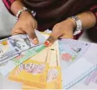  ??  ?? Inter-Pacific Research says the ringgit is trading below its fair value of 4.14 against the dollar.