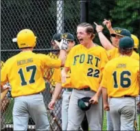  ?? CHRISTINE WOLKIN — FOR DIGITAL FIRST MEDIA ?? Members of the Fort Washington team celebrate a run against Roslyn.