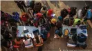  ?? ?? People line up at a job fair in New Delhi