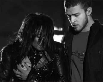  ?? DAVID PHILLIP / ASSOCIATED PRESS FILE (2004) ?? Janet Jackson, left, covers her breast after her outfit came undone during the halftime performanc­e with Justin Timberlake on Feb. 1, 2004, at Super Bowl XXXVIII in Houston.