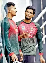  ??  ?? Bangladesh skipper Mahmudulla­h (right) and Soumya Sarkar. — AP