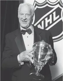  ?? FRANK GUNN/THE CANADIAN PRESS ?? Gordie Howe, seen in 2008 with his lifetime achievemen­t award at the NHL awards ceremony in Toronto.