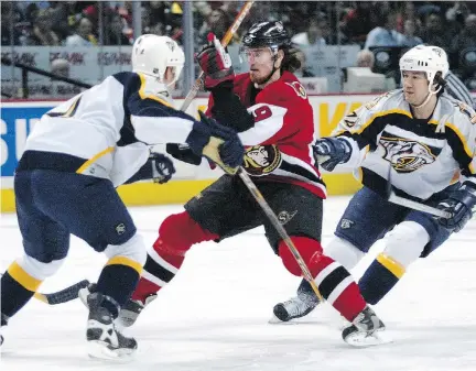  ?? WAYNE CUDDINGTON ?? Scott Walker, right, seen with the Predators in the 2003-04 season, enjoyed his experience in the club's first year in 1998.