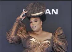  ?? PHOTO BY RICHARd SHOTwEll/InVISIOn/AP ?? In this June 23 file photo, Lizzo arrives at the BET Awards at the Microsoft Theater in Los Angeles.