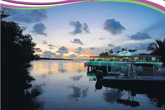  ?? PHOTOS BY FLORIDA RAMBLER/COURTESY ?? The Lorelei Cabana Bar, at Mile Marker 82 bayside in Islamorada, has decks, chickee huts, palm trees and a sandy waterfront, all adding up to an expansive place to watch the sunset.