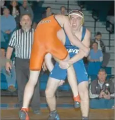  ?? Photo by Steve Sherman ?? Council Rock South’s Tom Shaatiel (R) competes for the Golden Hawks at 160 pounds. Shaatiel registered a major in his bout with Pennsbury’s Tom Cwenar Jan. 9 at South.