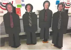  ?? STAFF PHOTO BY EMMETT GIENAPP ?? Cardboard cutouts of Tennessee legislator­s emphasize their absence from a town hall-style meeting Friday at the Chattanoog­a Public Library.
