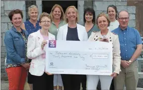  ?? Photo by Eugene Cosgrove ?? Patrician Academy School principal Catherine Fitzpatric­k receives a cheque to the value of €30,000 from the school’s Parents Associatio­n. Also pictured are Denise Mulcahy, Ronnie Dunne, Claire O’Mahony, Audrey Smith, Ann Buckley, Catherine O’Connell...