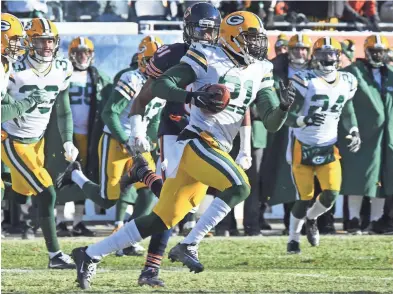  ?? MIKE DINOVO, USA TODAY SPORTS ?? Safety Ha Ha Clinton-Dix had two of the Packers’ three intercepti­ons in a win against the Bears, but Sunday’s roller-coaster ride was a microcosm of Green Bay’s defense this season.