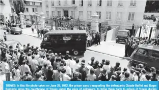  ?? — AFP ?? TROYES: In this file photo taken on June 26, 1972, the prison vans transporti­ng the defendants Claude Buffet and Roger Bontems leave the courthouse of Troyes under the gaze of onlookers, to bring them back to prison of Troyes during their trial.
