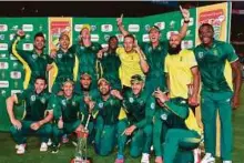  ?? AFP ?? South African teammates celebrate after winning the fifth and last One Day Internatio­nal (ODI) cricket match between South Africa and Sri Lanka at Supersport park cricket ground on Friday in Centurion, South Africa.