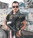  ??  ?? Ashley Dyball has become the poster boy for the foreign fighter group Lions of Rojava.