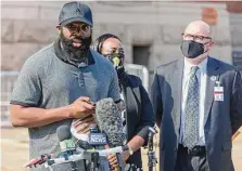  ?? William Luther/staff photograph­er ?? Mathias Ometu, a Black jogger who was mistakenly stopped by San Antonio police, is suing for compensato­ry damages.