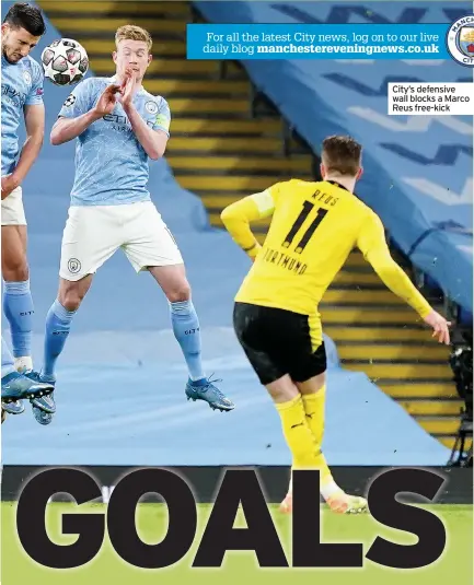  ??  ?? City’s defensive wall blocks a Marco Reus free-kick