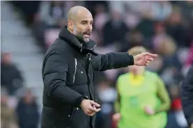  ??  ?? SUNDERLAND: Manchester City’s Spanish manager Pep Guardiola gestures on the touchline during the English Premier League football match between Sunderland and Manchester City at the Stadium of Light in Sunderland, north-east England on Sunday. — AFP