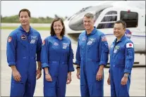  ?? JOHN RAOUX - THE ASSOCIATED PRESS ?? SpaceX Crew 2 members, from left, European Space Agency astronaut Thomas Pesquet, NASA astronauts Megan McArthur and Shane Kimbrough and Japan Aerospace Exploratio­n Agency astronaut Akihiko Hoshide gather at the Kennedy Space Center in Cape Canaveral, Fla., Friday, April 16, 2021to prepare for a mission to the Internatio­nal Space Station. The launch is targeted for April 22.