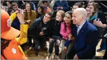  ?? SEAN RAYFORD — GETTY IMAGES ?? Former Vice President Joe Biden takes photos with supporters during a campaign event at Wofford University in Spartanbur­g, S.C., on Feb. 28.