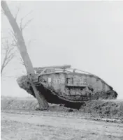  ??  ?? TANKS A LOT: A British tank uproots a large tree before the advance of the tank battle at Cambria during World War I.