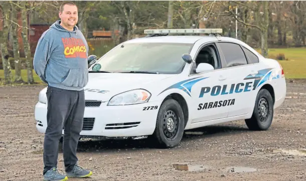  ??  ?? CALL THE COPS: Caleb Keogh, who recently moved to Edzell, bought the US police patrol car on ebay for £2,500. Pictures by Gareth Jennings.