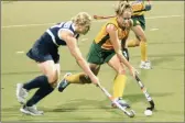  ??  ?? OUT: Fiona Butler, in the green and yellow for South Africa, in action against Australia at the Technikon Pretoria. The team will not take part in the next Olympics.