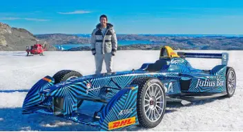  ??  ?? THREAT: FIA Formula E driver Lucas di Grassi with an electric racing car inside the Arctic circle, to raise awareness of the melting of the polar cap. Photo: FIA Formula E/PA Wire