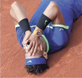  ??  ?? Rafael Nadal celebrates after beating Stan Wawrinka, 6-2, 6-3, 6-1, for the championsh­ip.