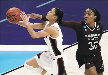  ?? Morry Gash / Associated Press ?? Stanford’s Anna Wilson zips past Missouri State's Jasmine Franklin en route to the basket. Wilson scored 13 points.