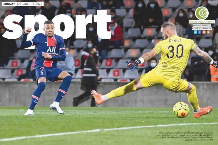  ?? — AFP ?? Paris Saint-germain’s French forward Kylian Mbappe (L) scores a goal during the French L1 football match between Nimes (NO) and Paris Saint Germain (PSG) at the Costieres Stadium in Nimes, southern France, on Friday.