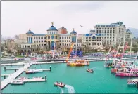  ?? WANG XIANGSHENG / CHINA DAILY ?? Clipper yachts berthed at the new Wanda Yacht Club, a state-ofthe-art facility in Qingdao West Coast New Area.