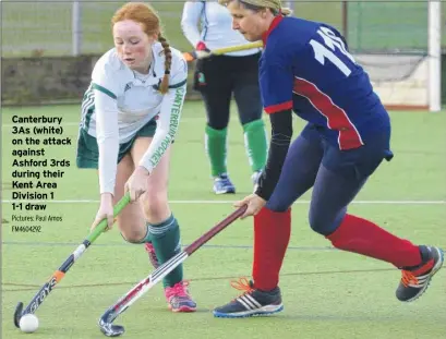  ?? Pictures: Paul Amos FM4604292 ?? Canterbury 3As (white) on the attack against Ashford 3rds during their Kent Area Division 1 1-1 draw