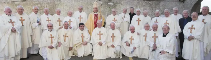  ??  ?? Bishop Denis Brennan and priests of the Diocese with Fr Robert Nolan at his jubilee celebratio­ns in Adamstown.