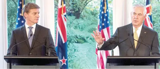  ??  ?? US Secretary of State Rex Tillerson and New Zealand’s Prime Minister Bill English address a joint press conference in Wellington on Tuesday. (AFP)