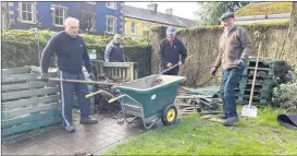  ?? ?? Working on the dismantlin­g of compost bays in Lismore’s Millennium Park are Lismore Tidy Towns members, l-r: Billy Ormond, Liam Ahearne, Sean Daly and Pat Fleming.