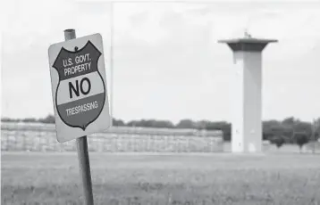  ?? MICHAELCON­ROY/AP ?? Ano trespassin­g sign is displayed outside the prison complex inTerre Haute, Indiana, where all federal executions take place. The U.S. is on pace for 13 executions sinceJulyw­hen it resumed the practice after a 17-year hiatus.