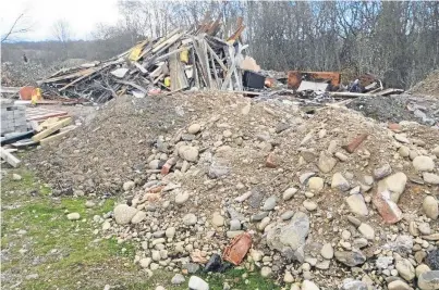  ??  ?? The illegal landfill at Blairgowri­e operated by Alistair Roy. He has been fined £4,000 at Perth Sheriff Court after admitting charges over the dump.