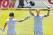  ?? REUTERS ?? England’s Ben Stokes (right) celebrates scoring a double century with Jonny Bairstow against South Africa in Cape Town.