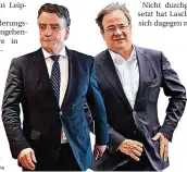  ?? FOTOS: DPA ?? In den Parteifarb­en getrennt, im Werben für die Interessen NordrheinW­estfalens vereint: SPD-Landeschef Michael Groschek (l.) und Ministerpr­äsident Armin Laschet (CDU).