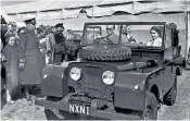  ??  ?? The Duke of Edinburgh, pictured left, behind the wheel of a Land Rover, with the Queen, in 1955. The Duke had a Land Rover Defender 130 Gun Bus, above, ‘hand built’ for him by the Foley firm